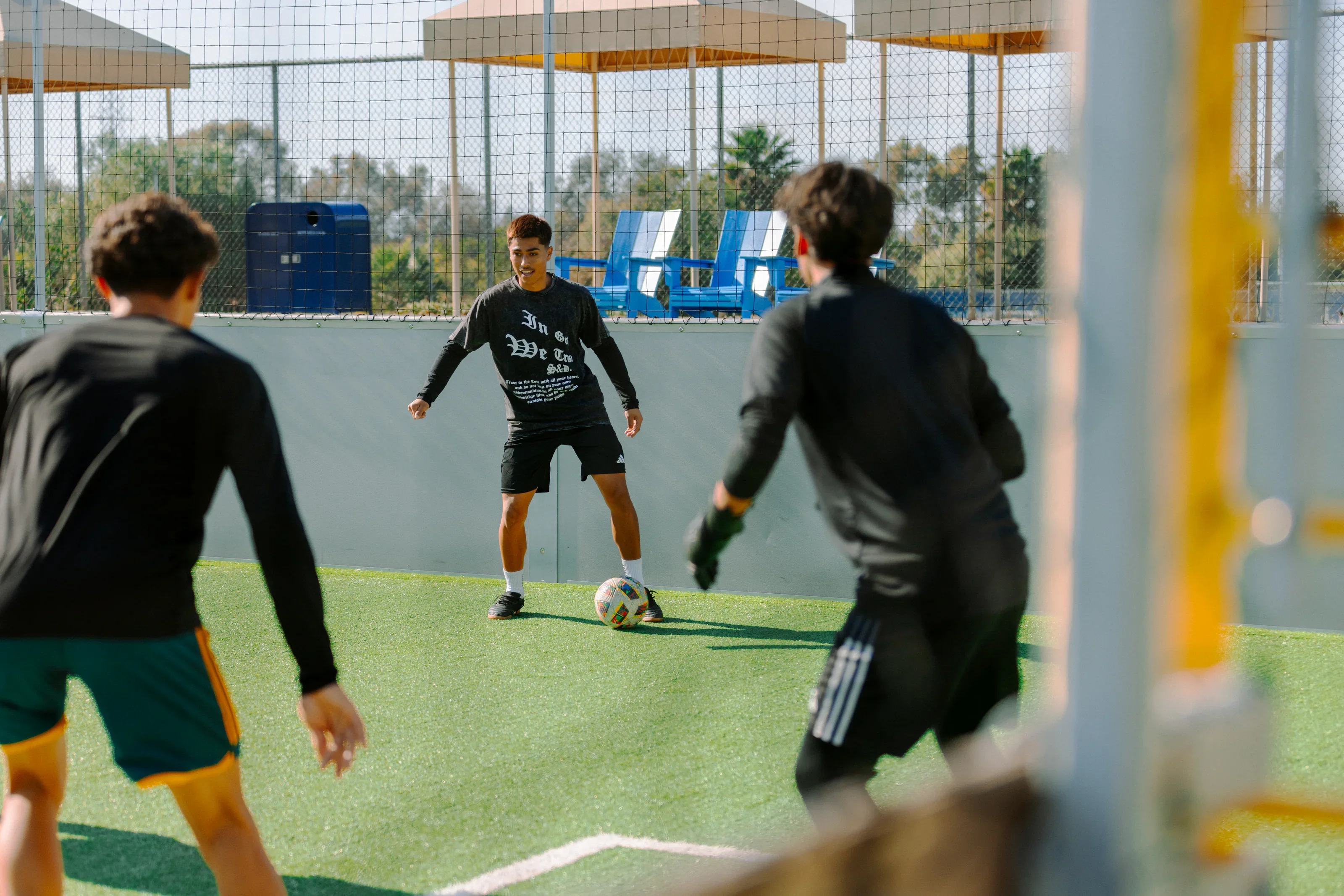 Athlete driving toward goal during live play